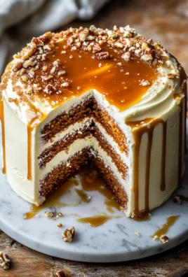 Pumpkin Cake with Cream Cheese Frosting and Salted Caramel Drizzle